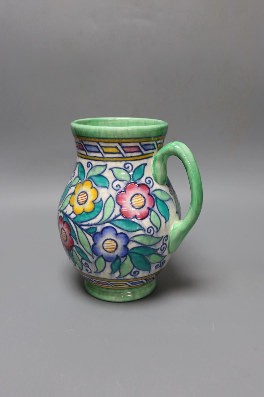 A Charlotte Rhead jug, 22 cms high.